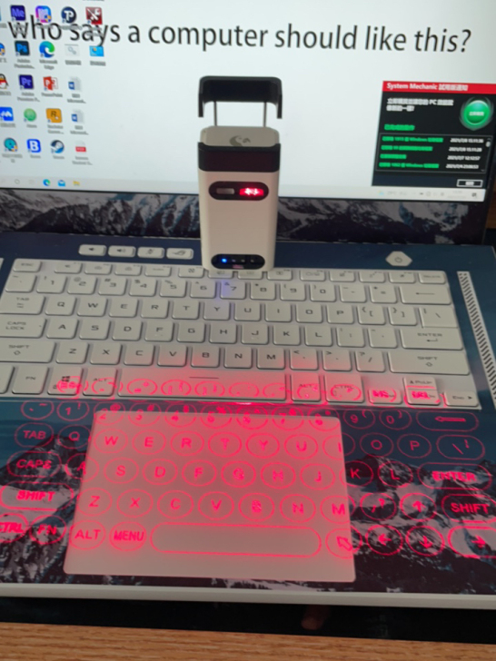激光键盘，typec充电蓝牙连接。比较灵敏...