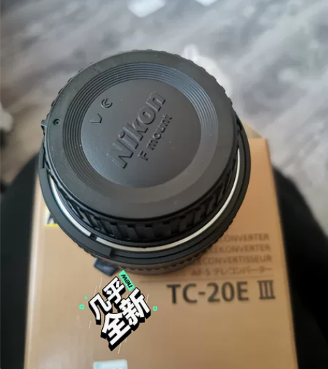 尼康2XIII代增倍镜。包装齐全。买回去试...
