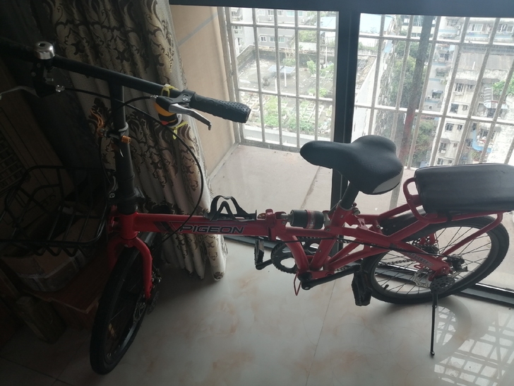 诱惑红折叠自行车 大小20英寸,距离近可送...