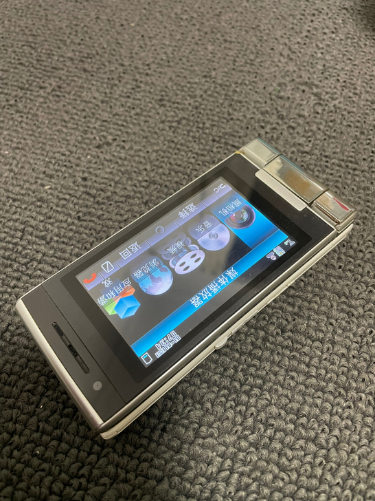 夏普sh805uc.成色不错.太阳能手机....
