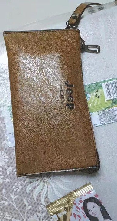 厂家处理男士长款钱包商务休闲手拿包简约超薄...