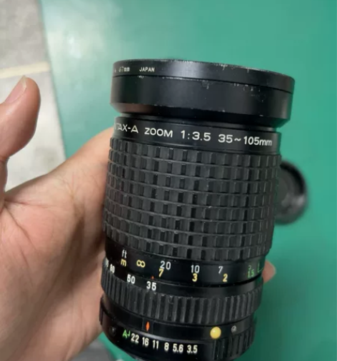 宾得A口变焦是手动镜头，35-105 F3...