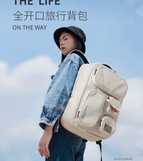 米熙双肩包男女书包2021新款大学生旅行外...