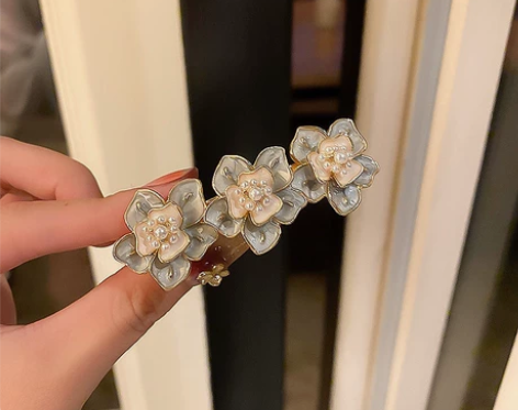 珍珠滴油花朵弹簧发夹 超级精致的一款 可作...