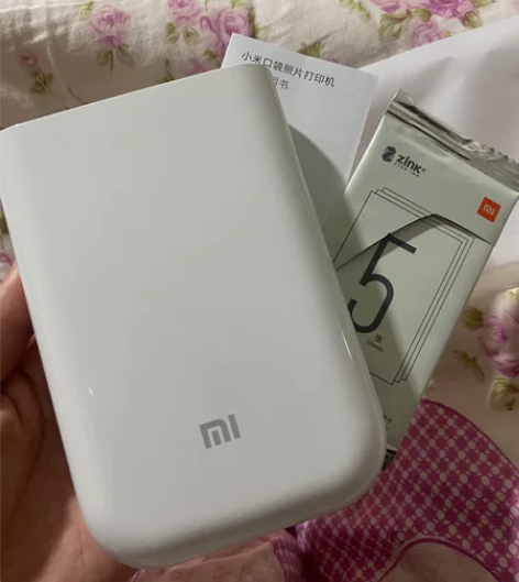 小米口袋打印相机 公司比赛奖品，用一次里面...